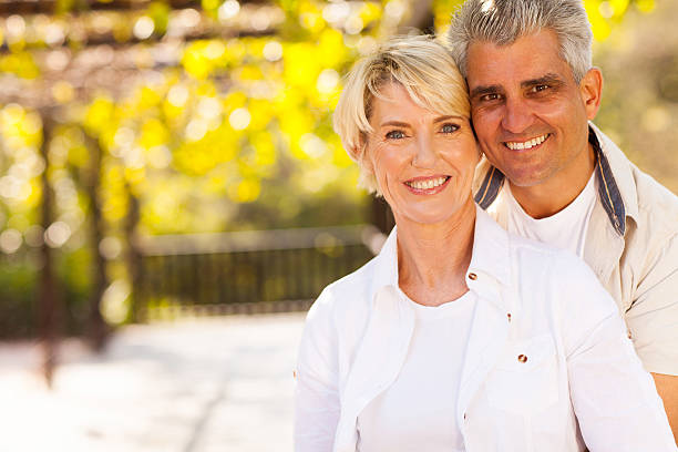 istock cute mid age couple outdoors 469675641