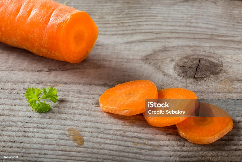 Chopped carrot Chopped carrot on a wood board,shallow dof 2015 Stock Photo