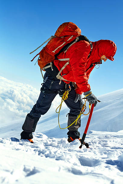 istock hiker at the top of a pass 469676118