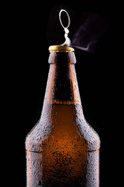 istock Top of open wet beer bottle 469681291