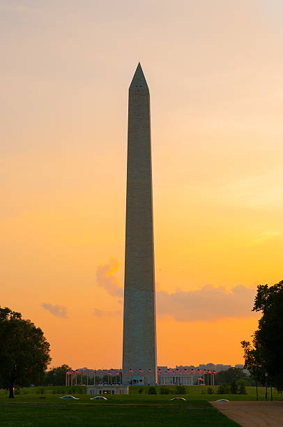 istock Washington Monument at sunset with peach / orange sky 469682294