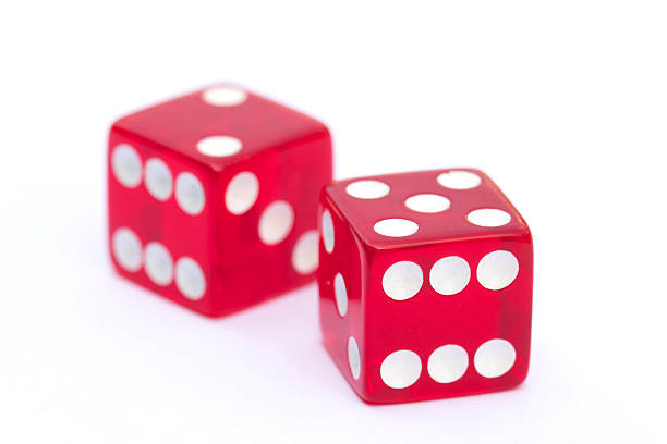 istock Red transparent dice isolated on white background 469682383