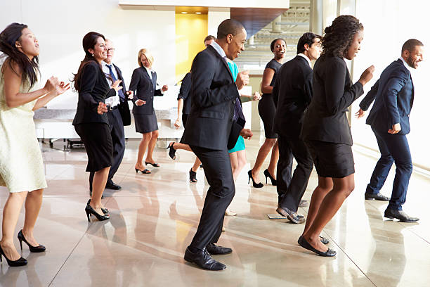 istock People in an office lobby dancing together 469683761