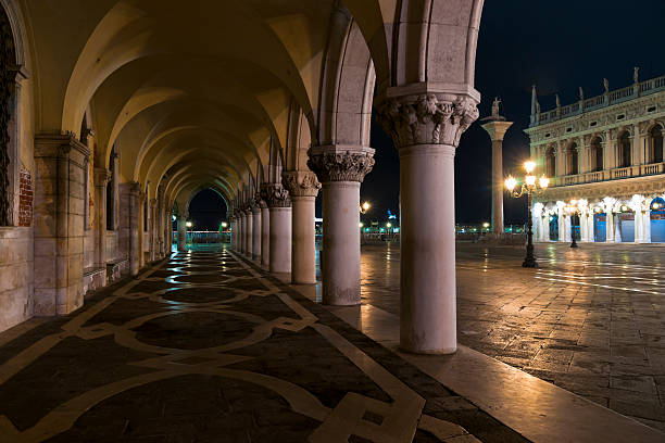istock Doges Palace arcade at night 469683787