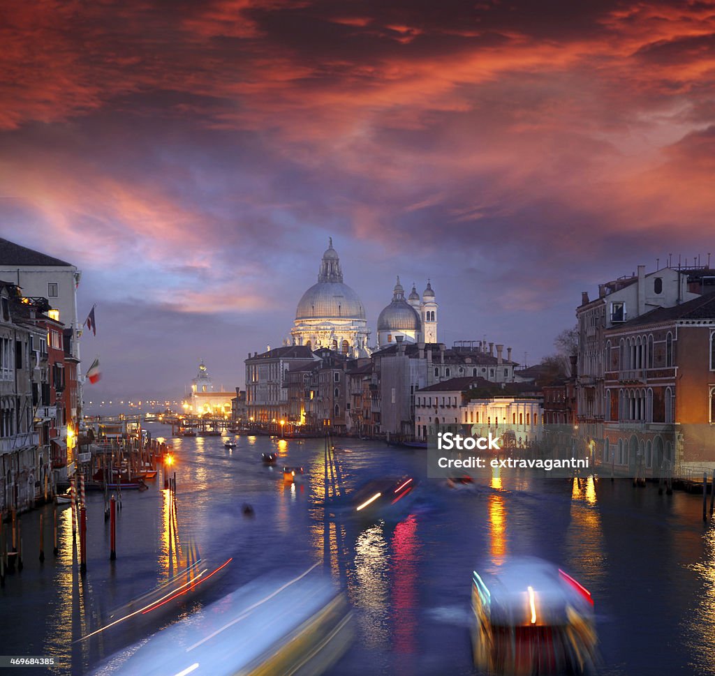Venice with busy Grand Canal in the evening,  Italy Grand Canal and Basilica Santa Maria della Salute during amazing evening in Italy Christmas Stock Photo