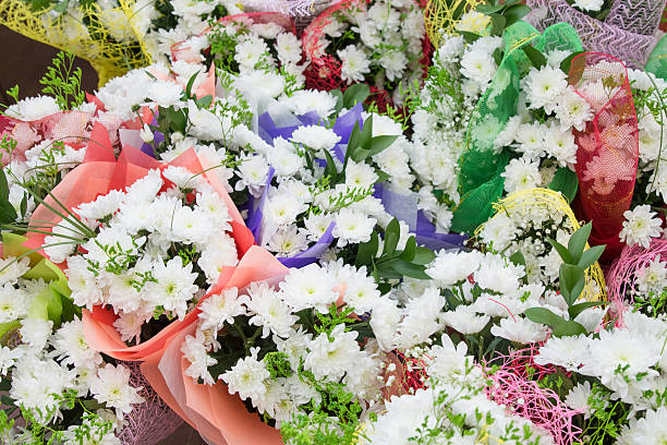 istock bouquets of white chrysanthemums in bright packages 469689883