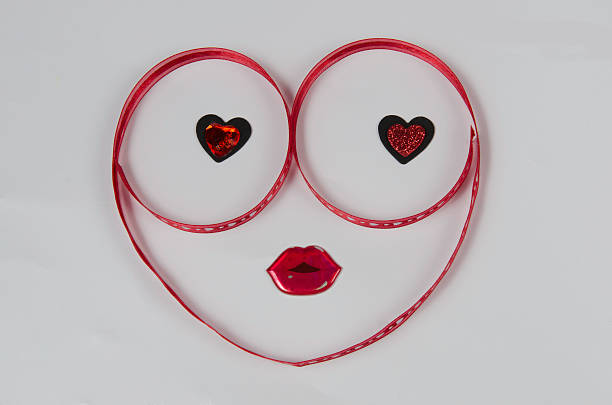 Heart shape face made with ribbon stock photo