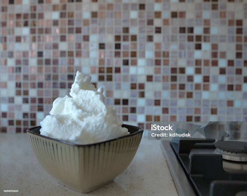 Ceramic Bowl of Towering Eggwhites Image produced with a Hasselblad H4D-40 camera and 35 mm lens using a Manfrotto tripod. 2015 Stock Photo
