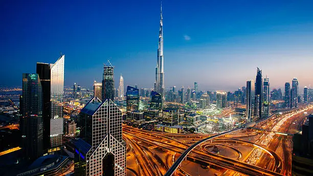 Dusk view of awesome Dubai's sky line, Aerial view of the city at blue hour.