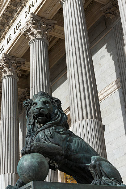 istock Lion statue outside the Spanish Congress in Madrid 469697205
