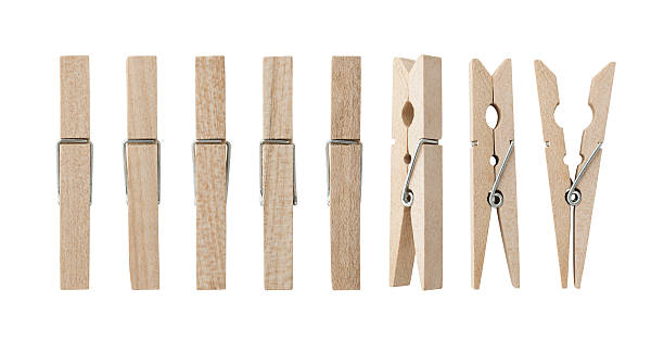 Set of wooden clothes pins Set of wooden clothes pins , clipping path , white background clothespin wood stock pictures, royalty-free photos & images