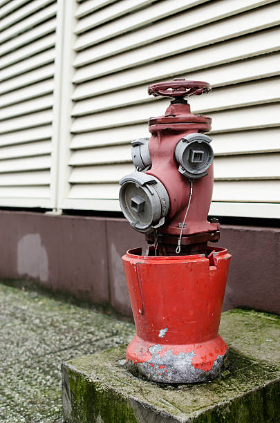 red fire hydrant on street stock photo