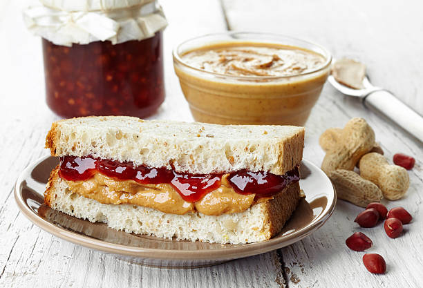 Peanut butter Peanut butter and strawberry jelly sandwich peanut butter and jelly sandwich stock pictures, royalty-free photos & images