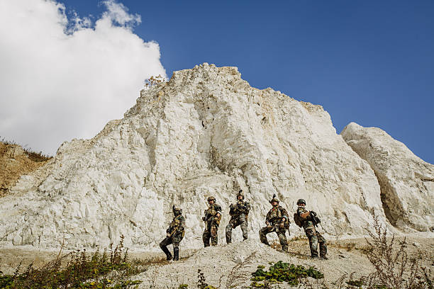 group of solders standing and looking at the camera