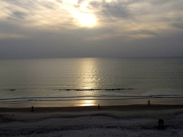 istock Sun Coming Up over Ocean 469703338