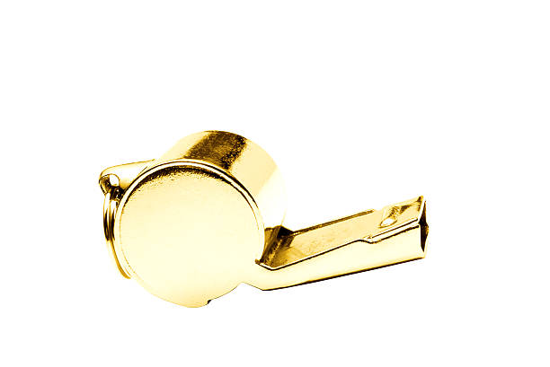 istock Golden whistle pendant isolated on white background 469703898