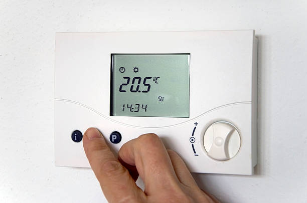 hand thermostat - disply stock-fotos und bilder
