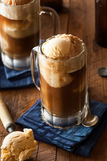 Refreshing Root Beer Float Refreshing Root Beer Float with Vanilla Ice Cream soda jerk stock pictures, royalty-free photos & images