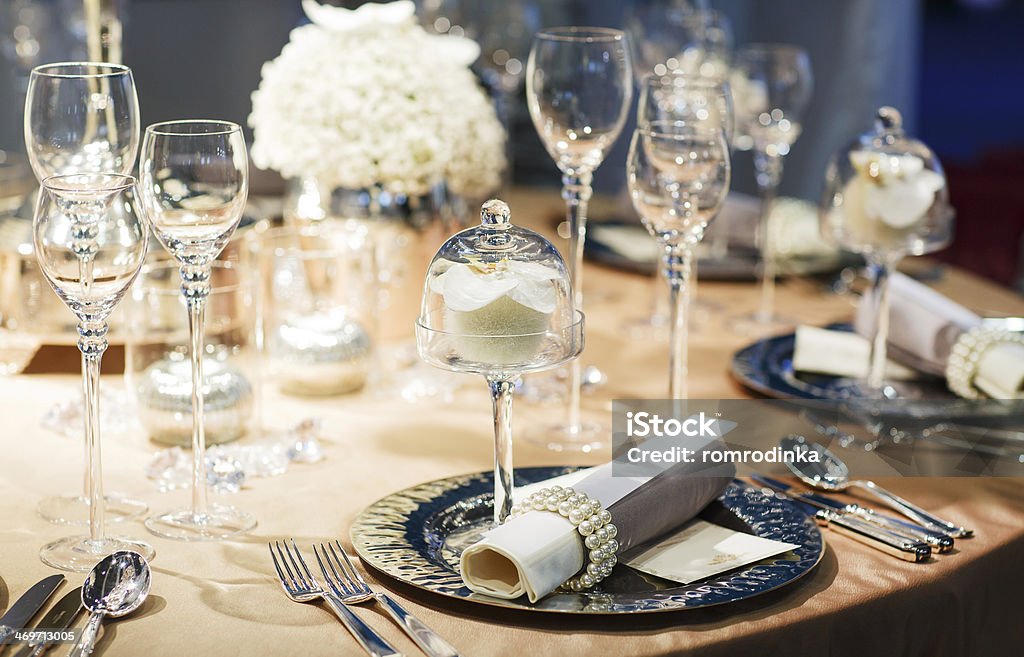 Elegant table set in soft creme for wedding Elegant table set in soft creme for wedding or event party Alcohol - Drink Stock Photo