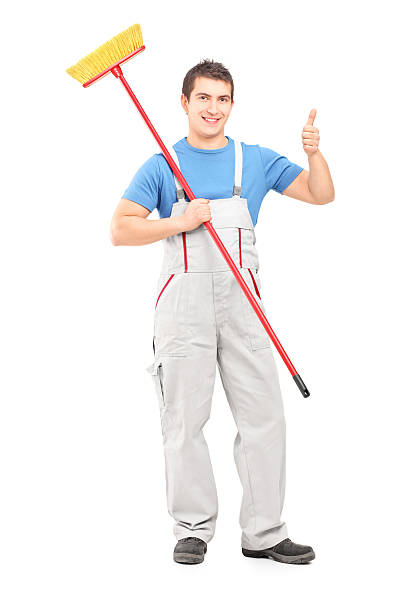 istock Male painter holding a roller and giving thumb up 469715803