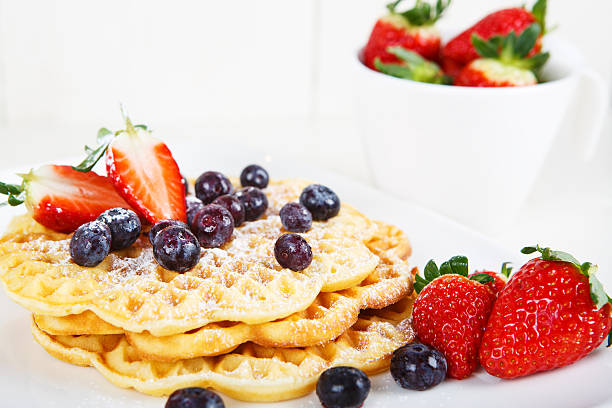 istock Crisp golden fresh baked waffle topped with pomegranate 469717031
