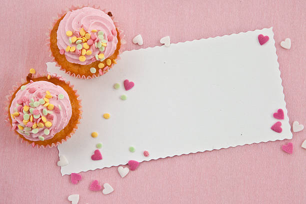 Little cupcakes on pink stock photo
