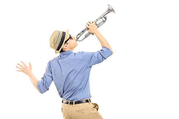 istock Excited young musician playing trumpet 469718297