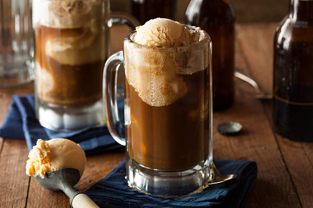 Refreshing Root Beer Float Refreshing Root Beer Float with Vanilla Ice Cream soda jerk stock pictures, royalty-free photos & images
