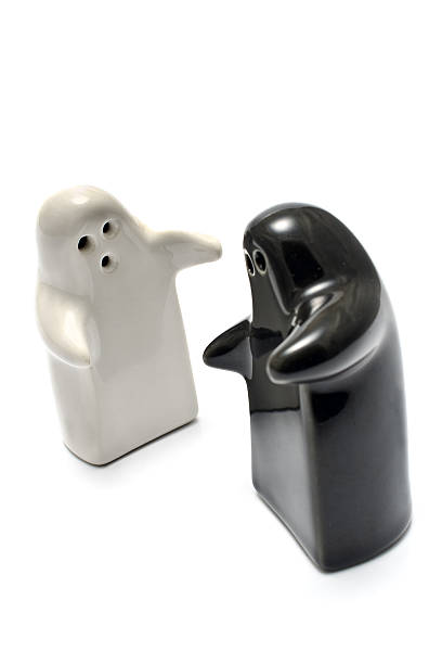 istock Salt and pepper shakers isolated on white 469722247