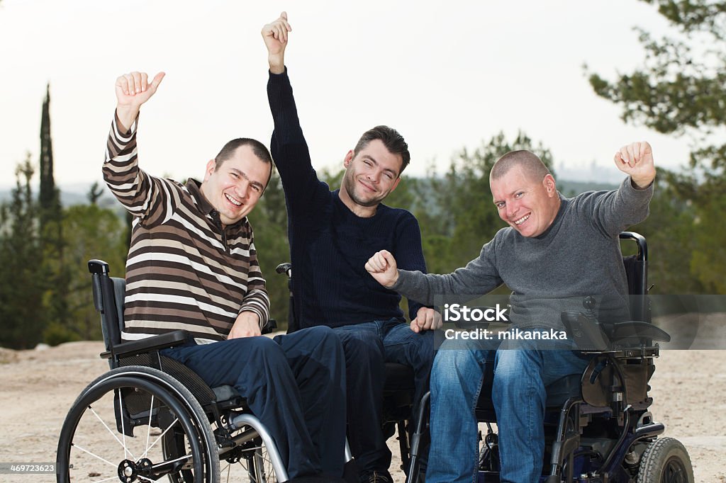 Disabled friends Disabled Happy friends  with thumbs up. Group Of People Stock Photo