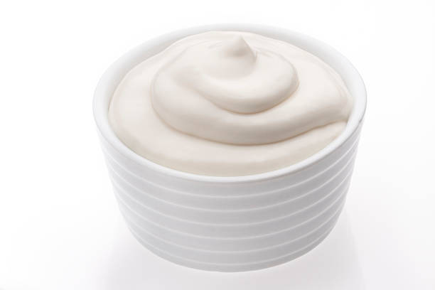 istock A bowl of sour cream on a white background 469724911