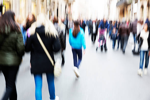 istock People walking around in the street 469732556