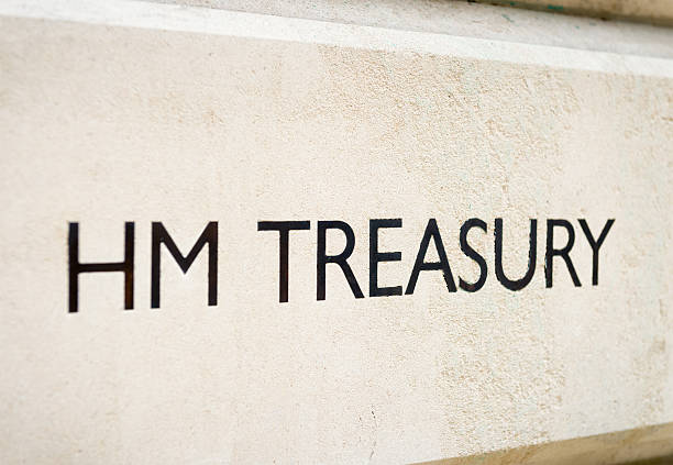 HM Treasury Sign A sign in Whitehall, London, for the UK Treasury Government department. chancellor photos stock pictures, royalty-free photos & images