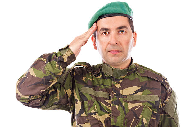 istock Young army soldier saluting isolated 469733225