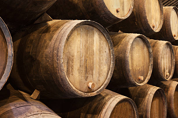 istock Stacked wooden wine barrels in Porto  469734128