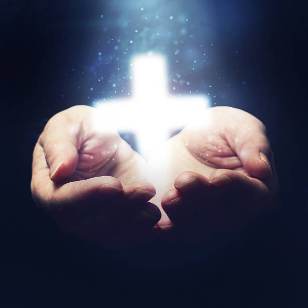 istock Open hands holding Christianity cross 469737559