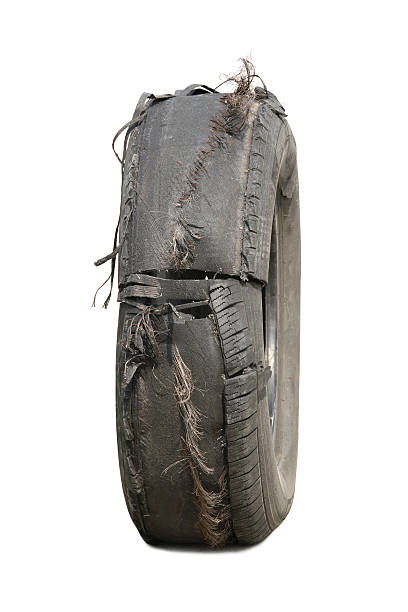 повреждение колесо - old tire стоковые фото и изображения