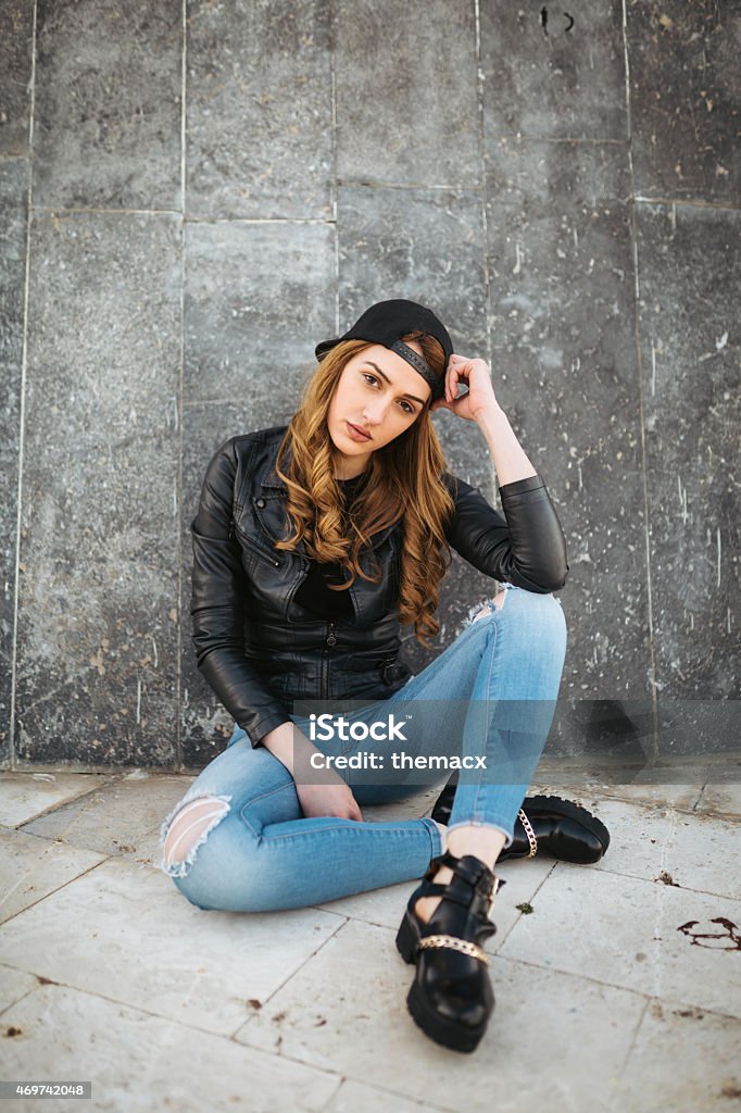 Young woman street style Young woman street style with gray marble. 20-29 Years Stock Photo