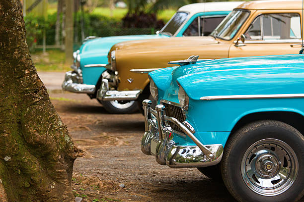 istock Front of three classic old car in Cuba 469742372