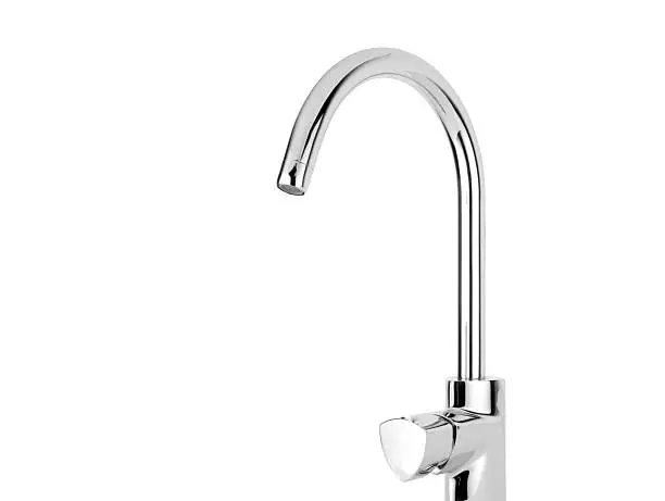 Modern stainless steel tap. Isolated on white background.