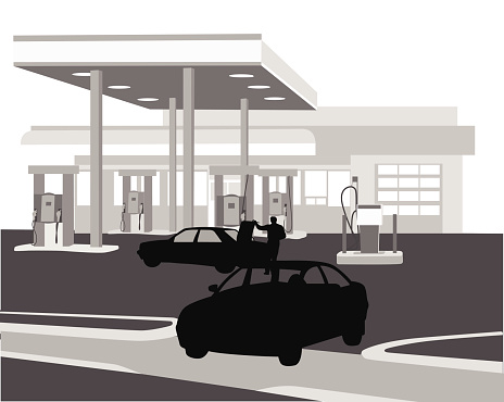 A silhouette illustation of two cars at a gas station.  One car is leaving the parking lot while  man is looking into the trunk of the other car.  The gas station has four gas pumps, one diesle pump, and a garage service bay.