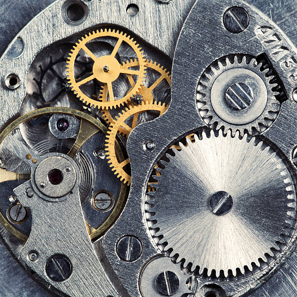 Close up of the gears of a clock Metal gears of old clock mechanism clockworks photos stock pictures, royalty-free photos & images