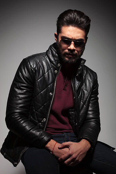 istock dramatic shot of a young man with beard 469743737