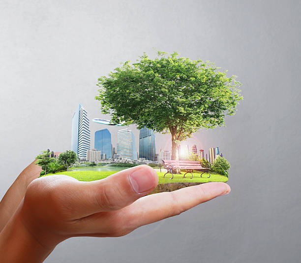 istock human hand holding  city 469743789