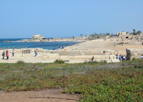 Caesarea, Israel - January 1, 2003: Group of tourist  visit the Roman Racetrack one of the most interesting places in ancient Caesarea was built by Herod the Great