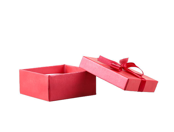 istock Red gift box with white ribbon isolated on red background. 469747106