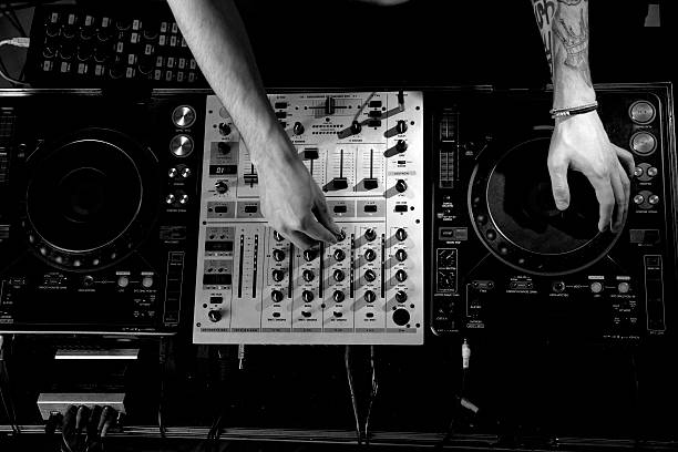 istock Disc jockey mixing music 469749860