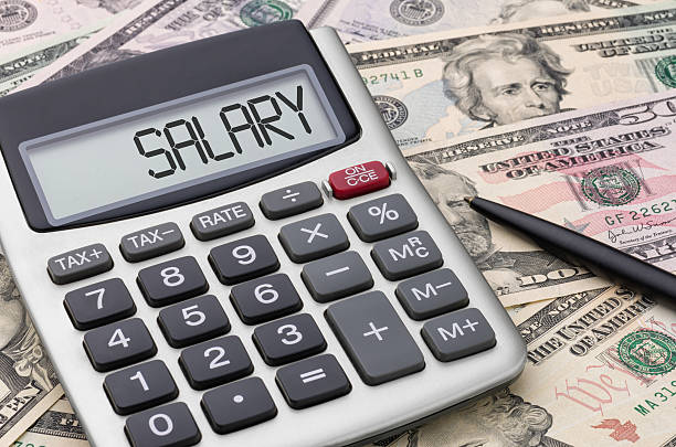 istock Calculator with money - Salary 469750492