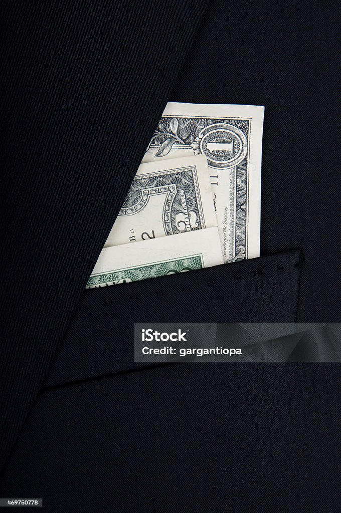 suit pocket full of dollar bills  black suit pocket full of dollar bills 2015 Stock Photo