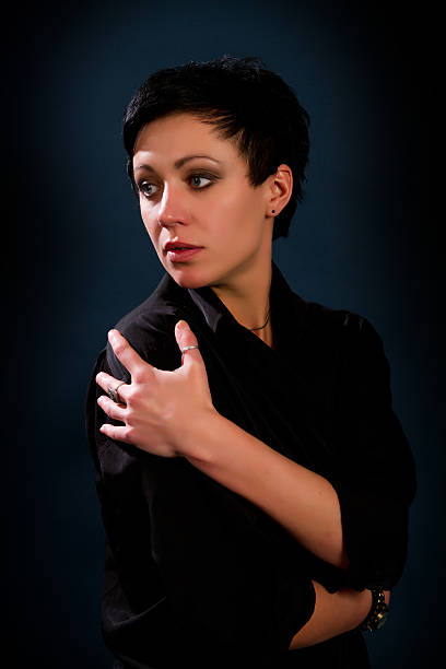 istock girl in a black man's shirt 469751985